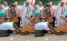 Congress leader Epuri Satish pressing the legs of an old lady